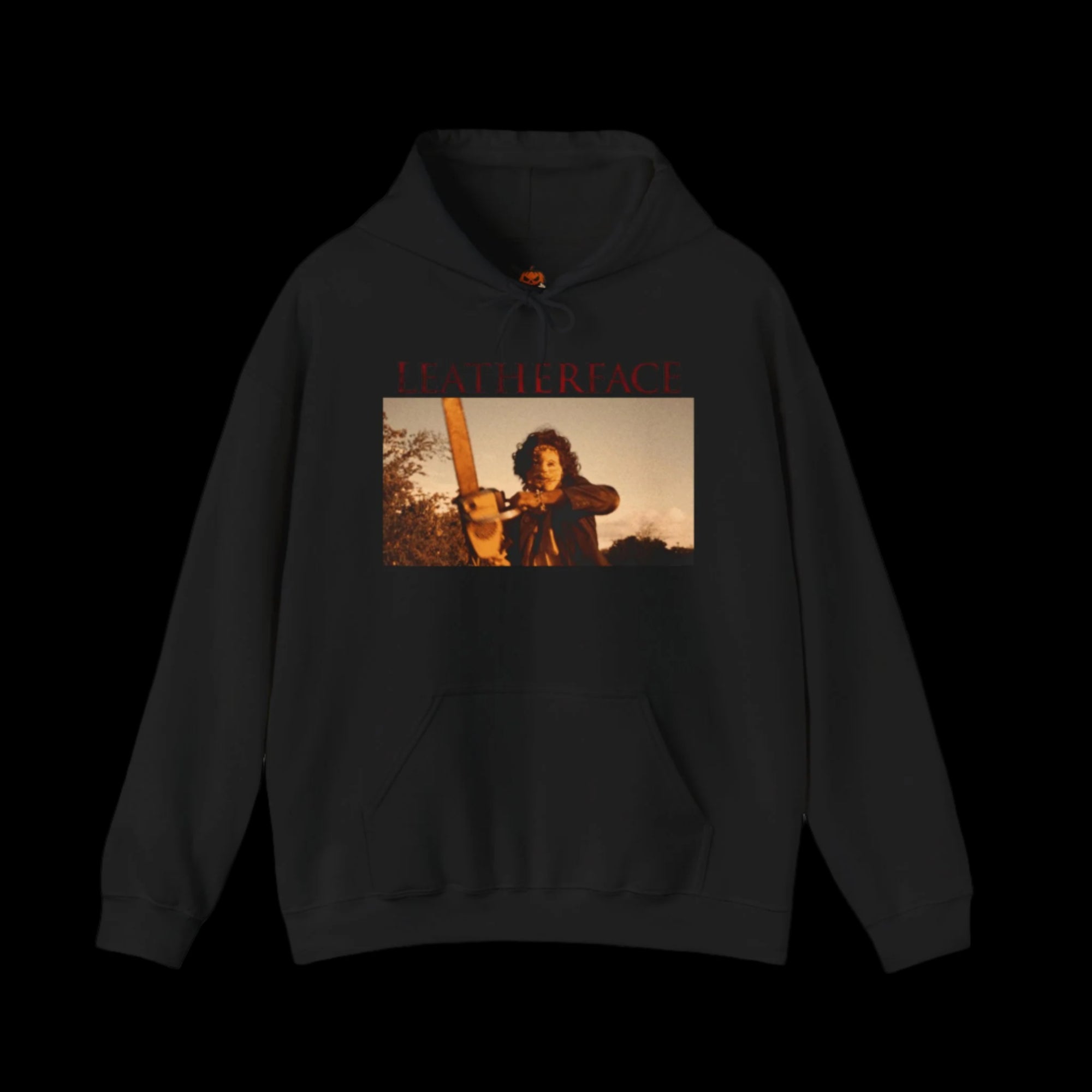 Black hoodie with a graphic of a person holding a chainsaw and 'LEATHERFACE' text on a black background