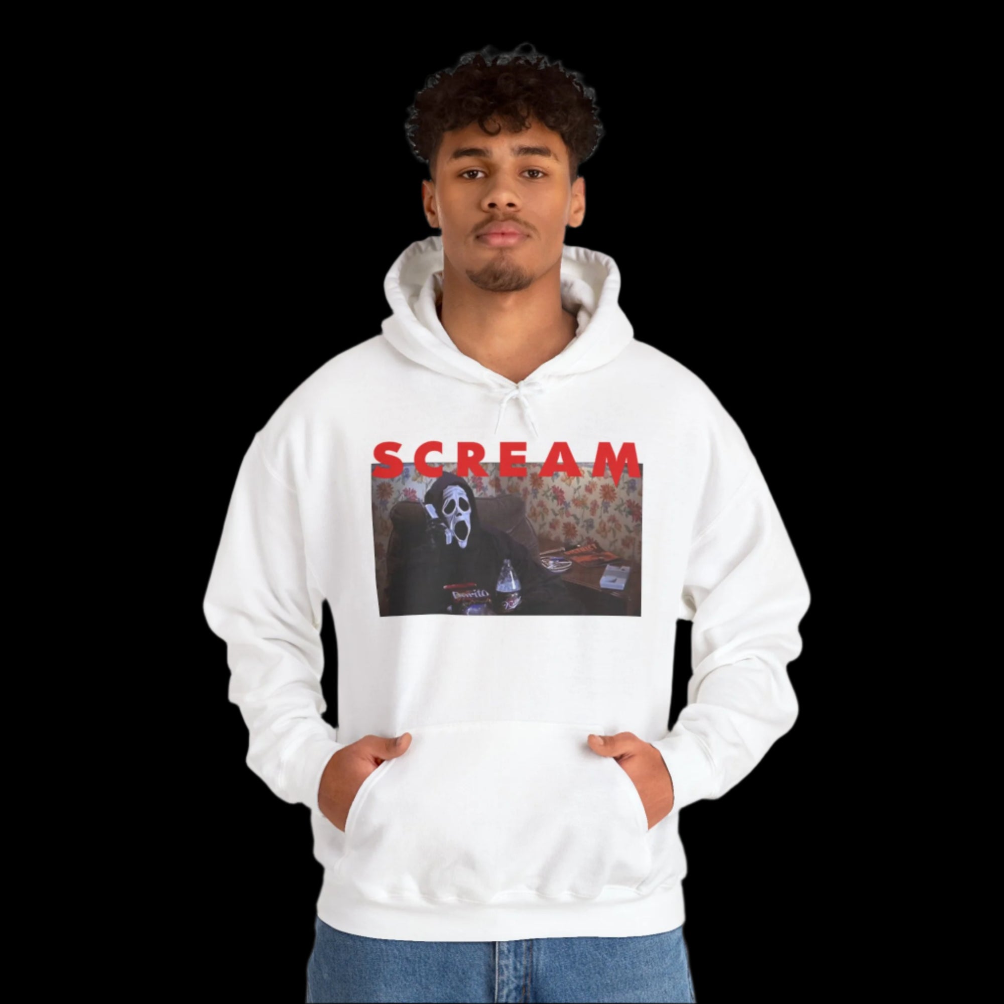 Person wearing a white hoodie with 'SCREAM' graphic design on a white background
