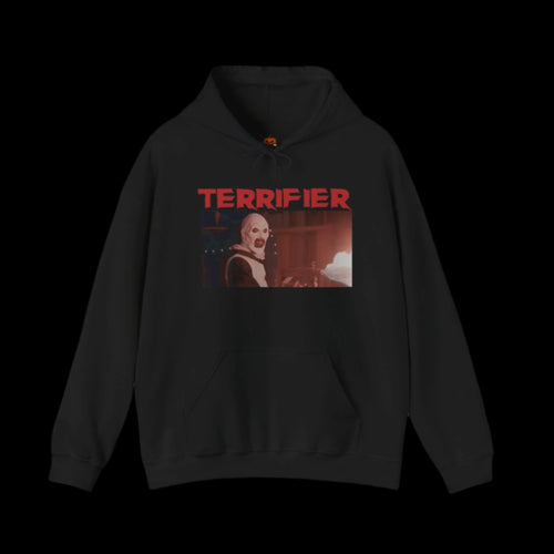 Black hoodie with 'Terrifier' graphic design of Art The Clown on a white background